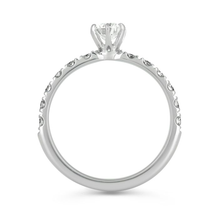 Золотое помолвочное кольцо с бриллиантами по шинке и одним крупным бриллиантом 