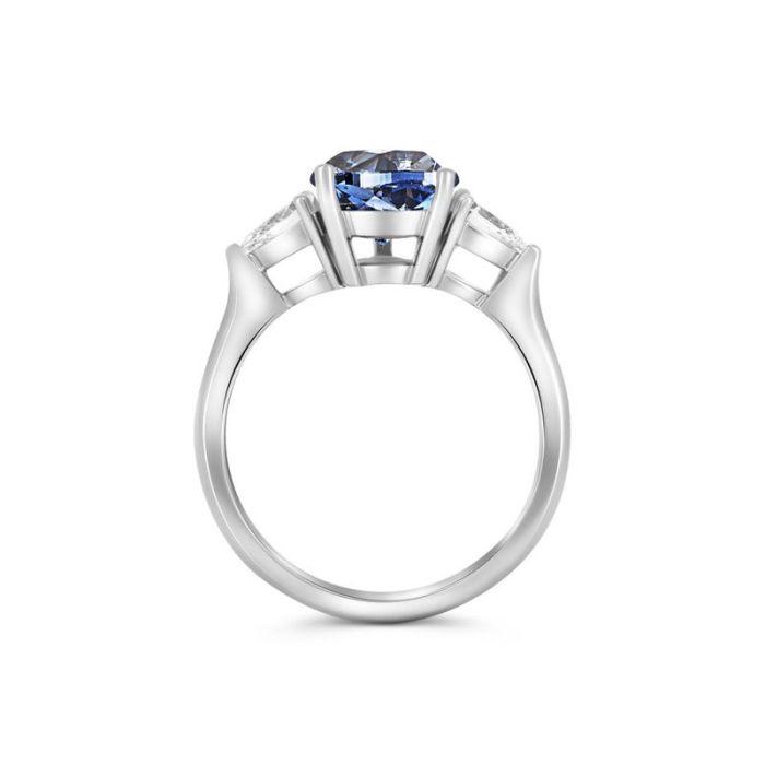 Кольцо из белого золота с голубым бриллиантом