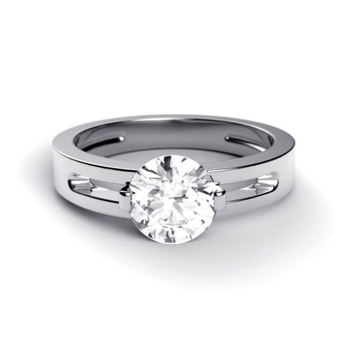 Платиновое помолвочное кольцо с бриллиантом и шинкой оригинальной формы