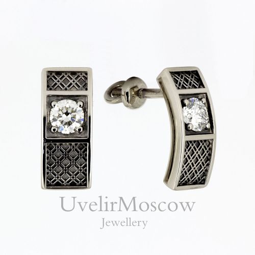 Золота серьги с бриллиантами и объемным узором