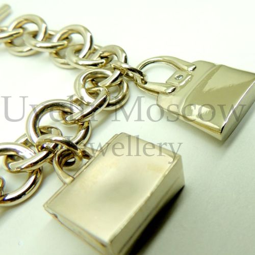 Браслет из белого золота с подвесками