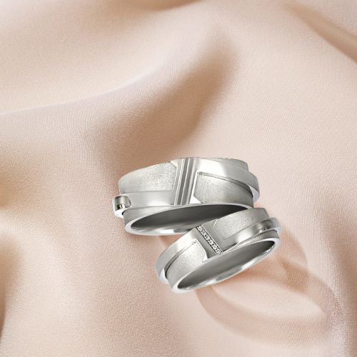 Дизайнерские обручальные кольца из платины с бриллиантами