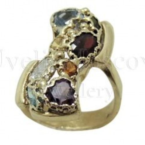 Кольцо из желтого золота с драгоценными камнями