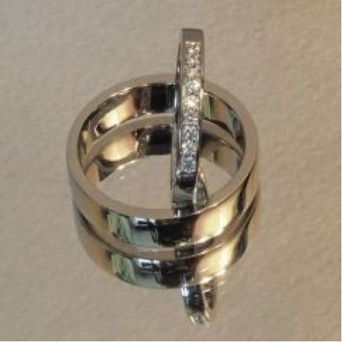 Обручальные кольца из платины 950 пробы с бриллиантами