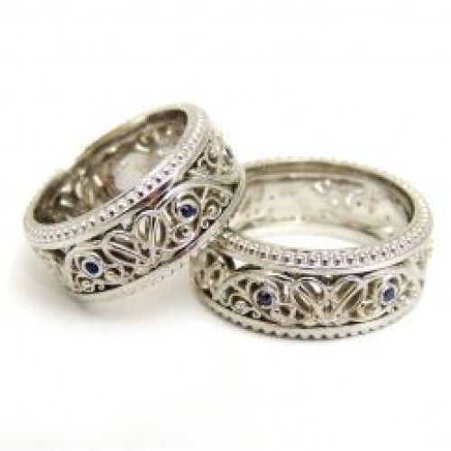 Парные обручальные кольца из белого золота с сапфирами
