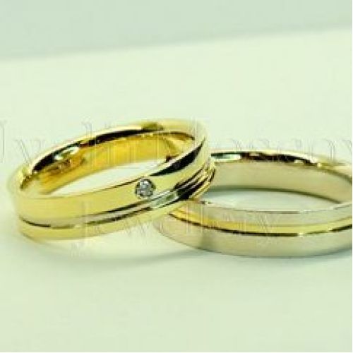 Парные обручальные кольца из комбинированного золота