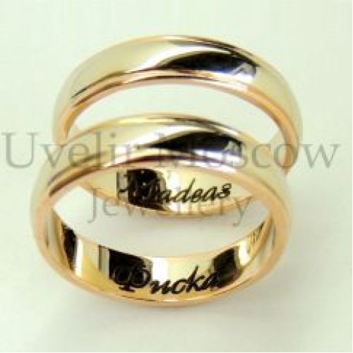 Парные обручальные кольца из комбинированного золота с гравировкой