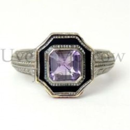 Перстень из белого золота с аметистом и рубинами