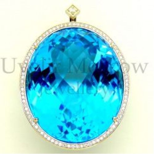 Подвеска из белого золота с крупным топазом и бриллиантами