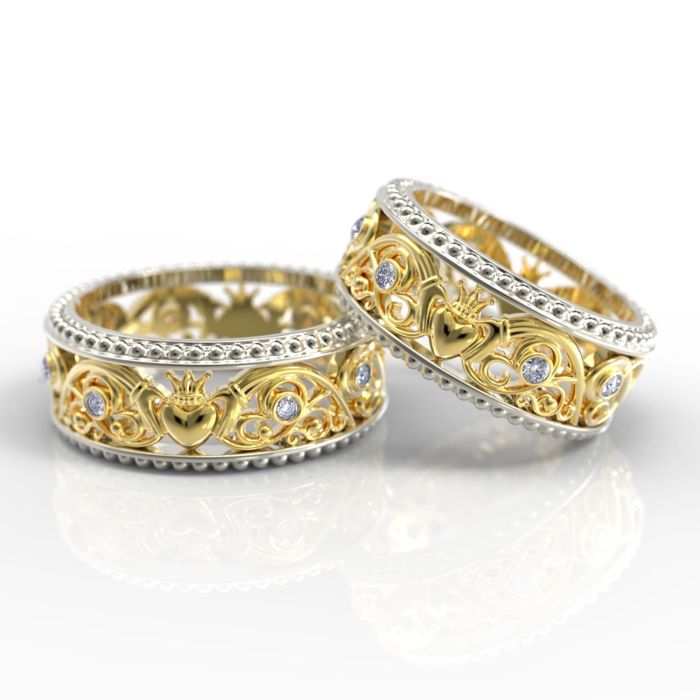 Обручальные кольца с "кладдахской" символикой и рельефным орнаментом из желтого золота