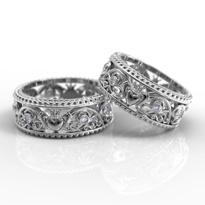 Обручальные кольца с "кладдахской" символикой и рельефным орнаментом из серебра