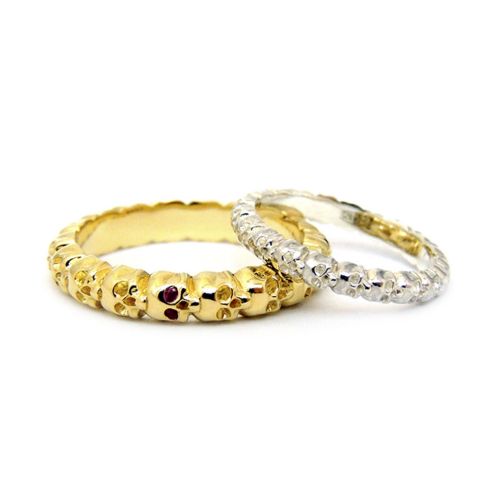 Обручальные кольца с объемными черепами из белого и желтого золота с рубинами