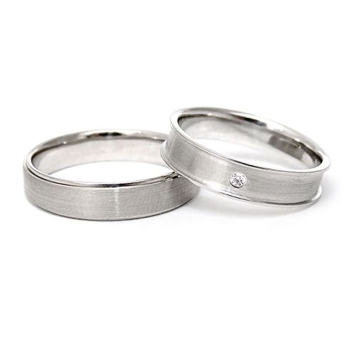 Обручальные кольца «Ролики» из белого золота с бриллиантом 