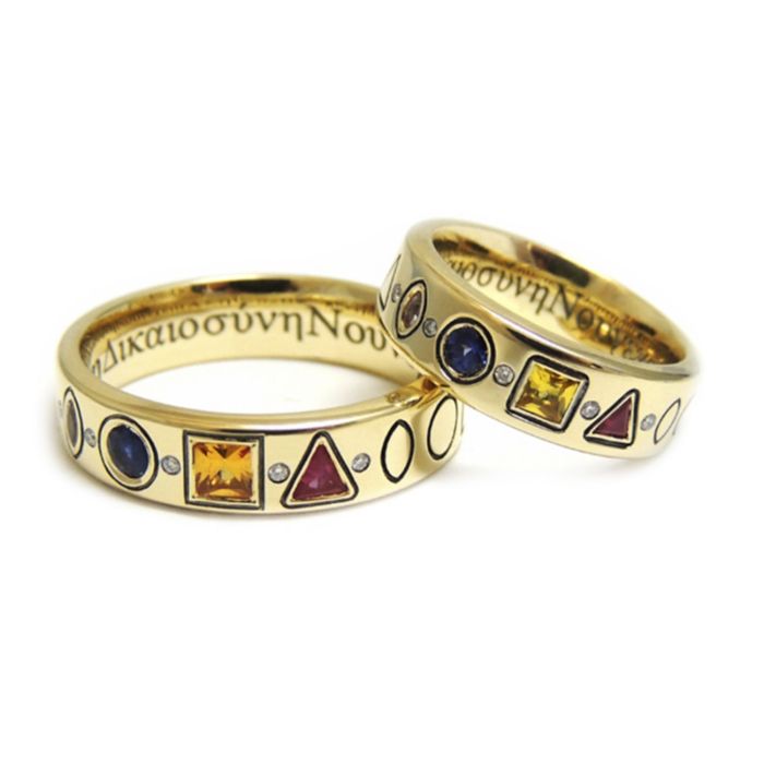 Обручальные кольца интересного дизайна с разноцветными сапфирами разной формы
