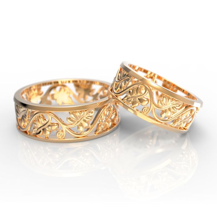 Парные обручальные кольца с листьями из комбинированного золота