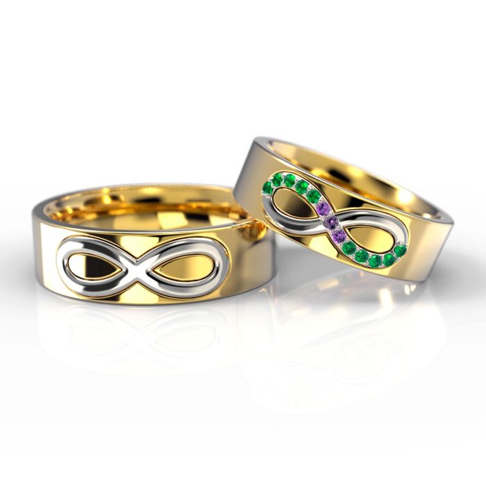 Обручальные кольца «Бесконечность» с изумрудами и сапфирами