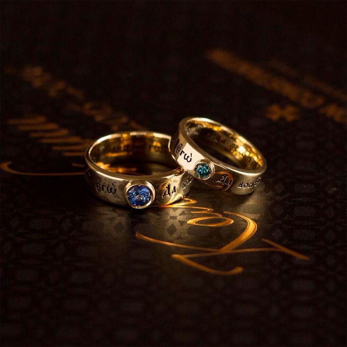 Обручальные кольца с сапфиром и голубым бриллиантом