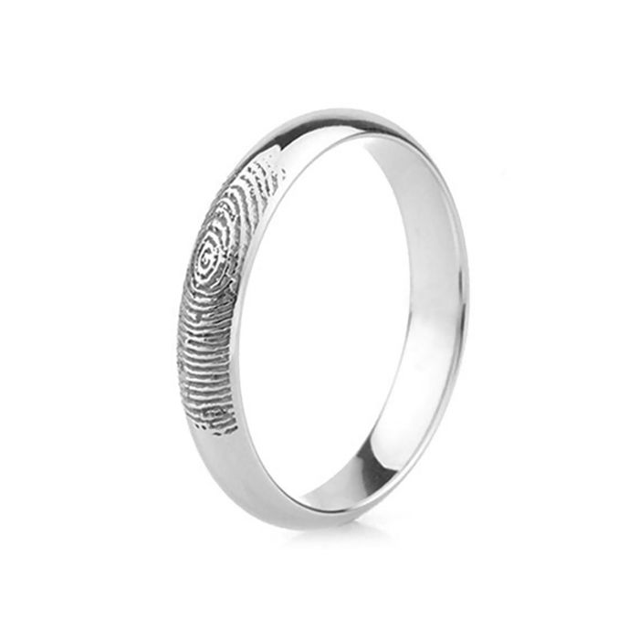 Обручальное кольцо из белого золота с отпечатком пальца на лицевой стороне
