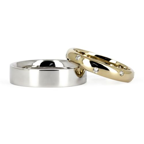 Комбинированные обручальные кольца из белого и желтого золота с бриллиантами