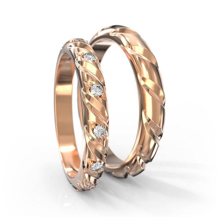 Парные обручальные кольца из белого золота с рельефом и бриллиантами