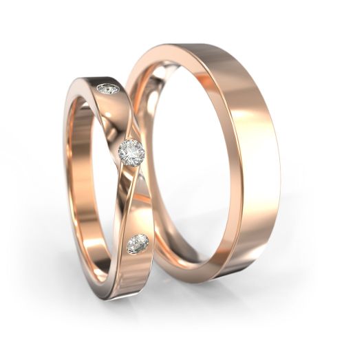 Обручальные кольца из красного золота с символом бесконечности в женском кольце