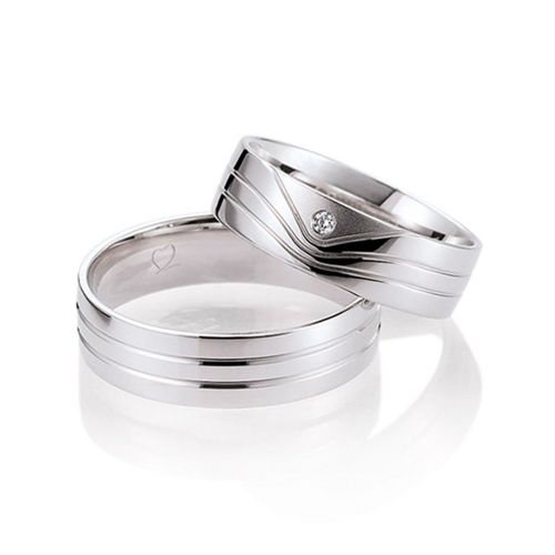 Парные обручальные кольца из серебра с бриллиантами