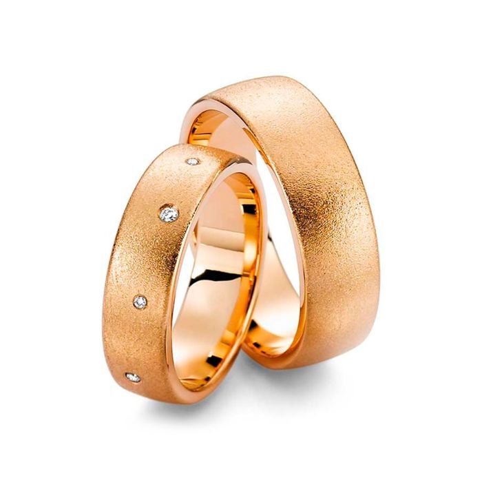 Обручальные кольца парные из красного золота с бриллиантами 