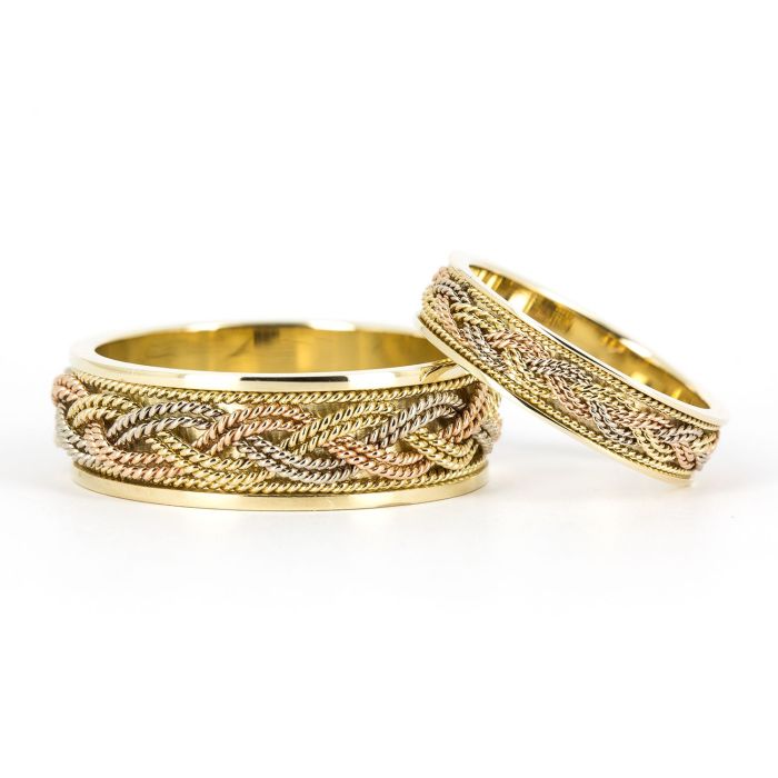 Золотые обручальные кольца парные в форме плетения 