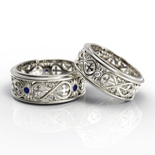 Обручальные кольца «Бесконечность» из белого золота с бриллиантами