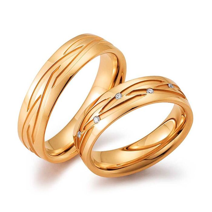 Обручальные кольца из красного золота с узором в виде плетения 