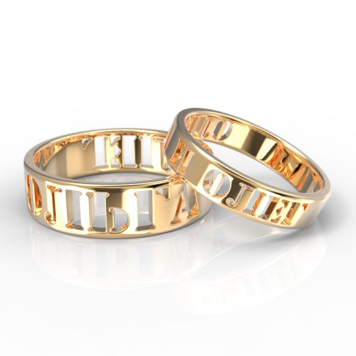 Дизайнерские обручальные кольца с именами из белого золота