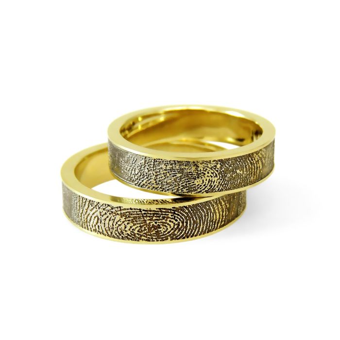 Обручальные золотые кольца с отпечатками пальцев