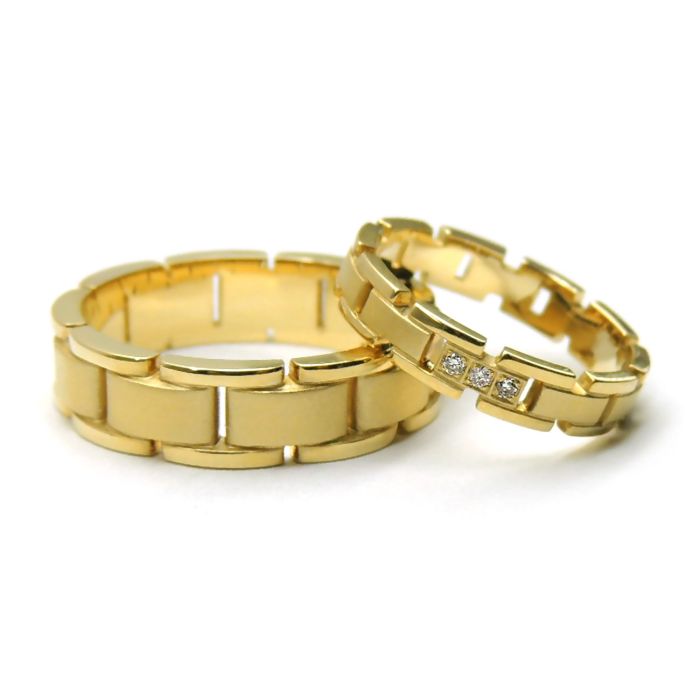 Оригинальные золотые обручальные кольца с бриллиантами