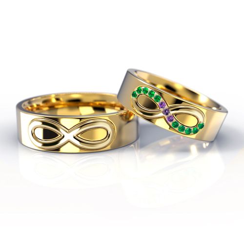 Обручальные кольца «Бесконечность» с изумрудами и сапфирами