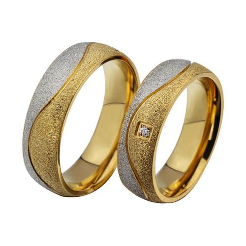 Обручальные шершавые кольца с волнистыми линиями двух цветов золота