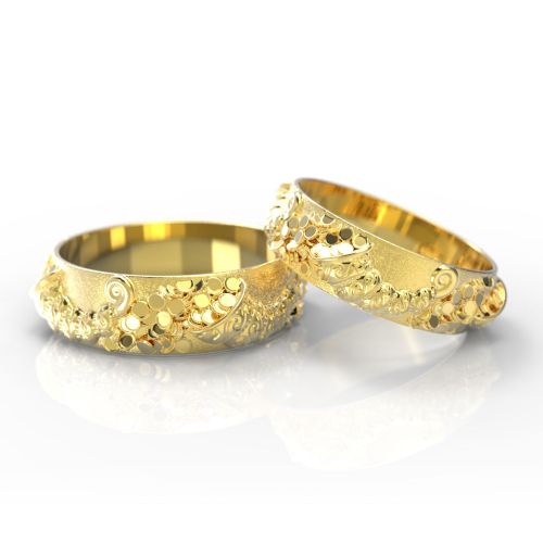 Парные обручальные кольца с объемным узором из желтого золота