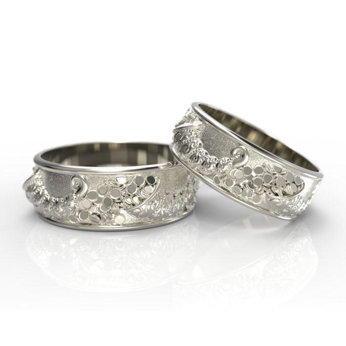 Обручальные парные кольца с объемным узором из белого золота
