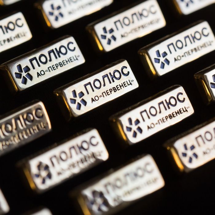 Корпоративный значок компании «Полюс»