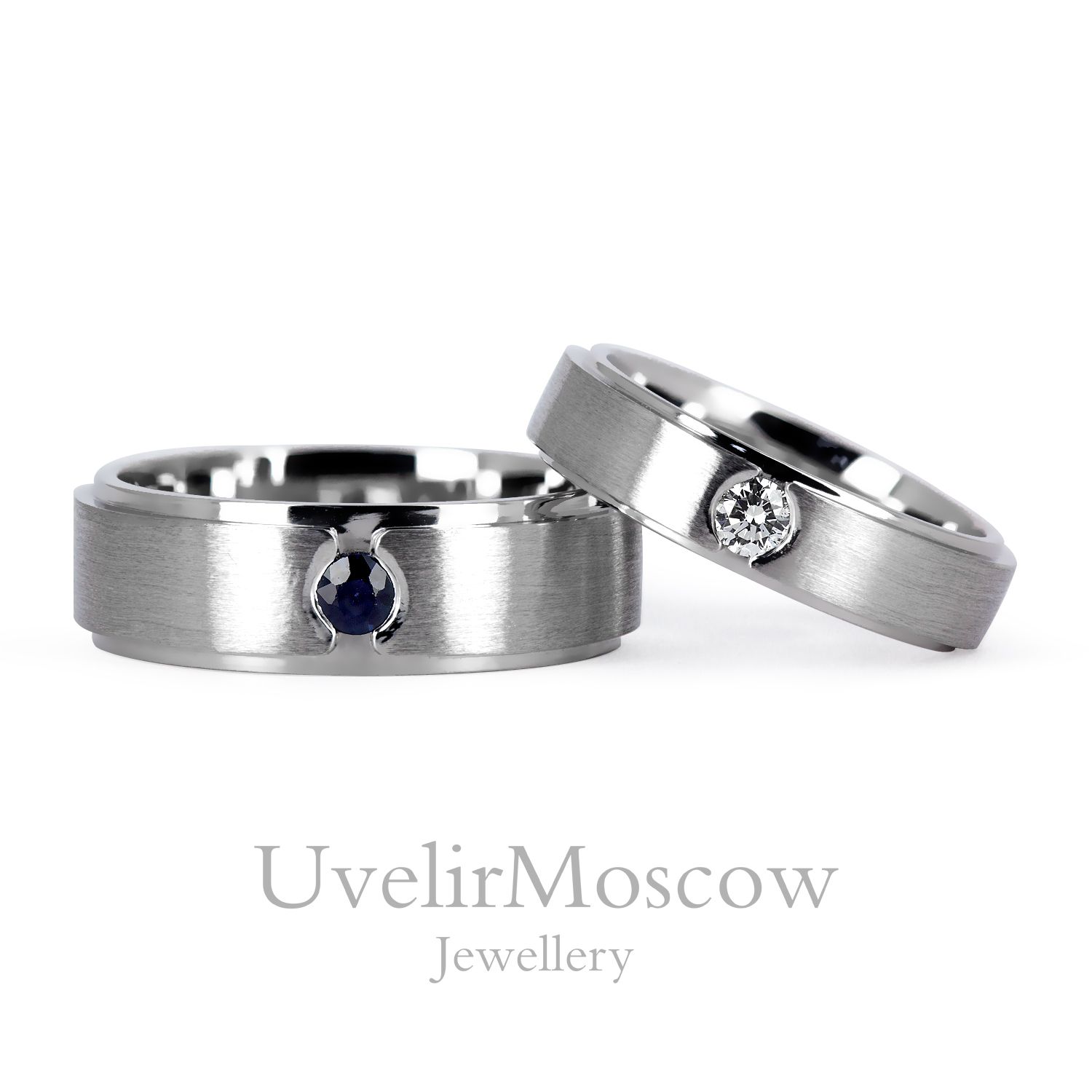 Обручальные кольца из белого золота бриллиантом и сапфиром
