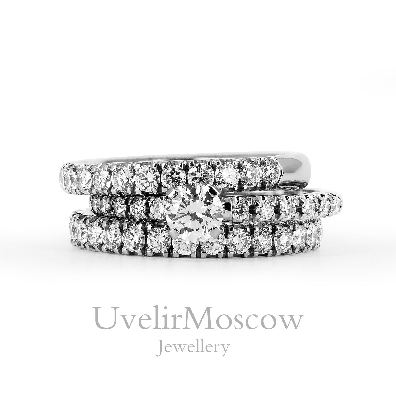 Комплект бриллиантовых колец из белого золота (обручальное и помолвочное)