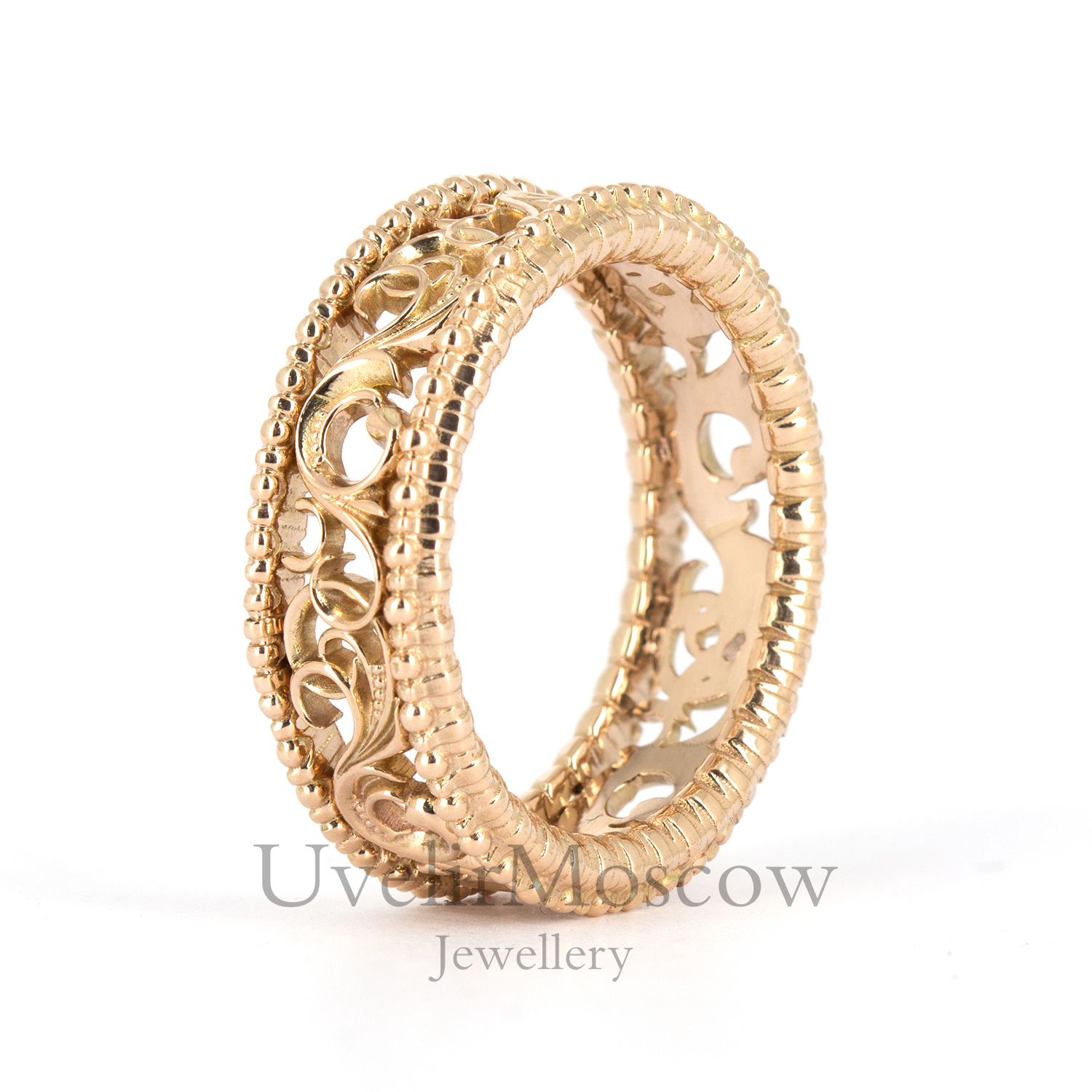 Обручальное кольцо из красного золота с растительным орнаментом