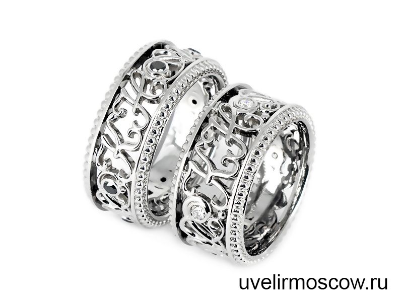 Кольца из белого золота с белыми и черными бриллиантами