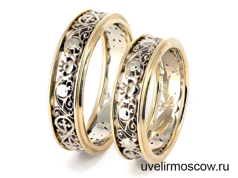 Обручальные кольца из желтого и белого золота со сквозным узором