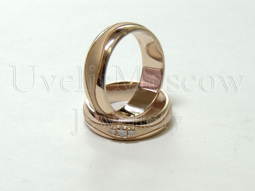 Парные обручальные кольца «Волна» из красного золота