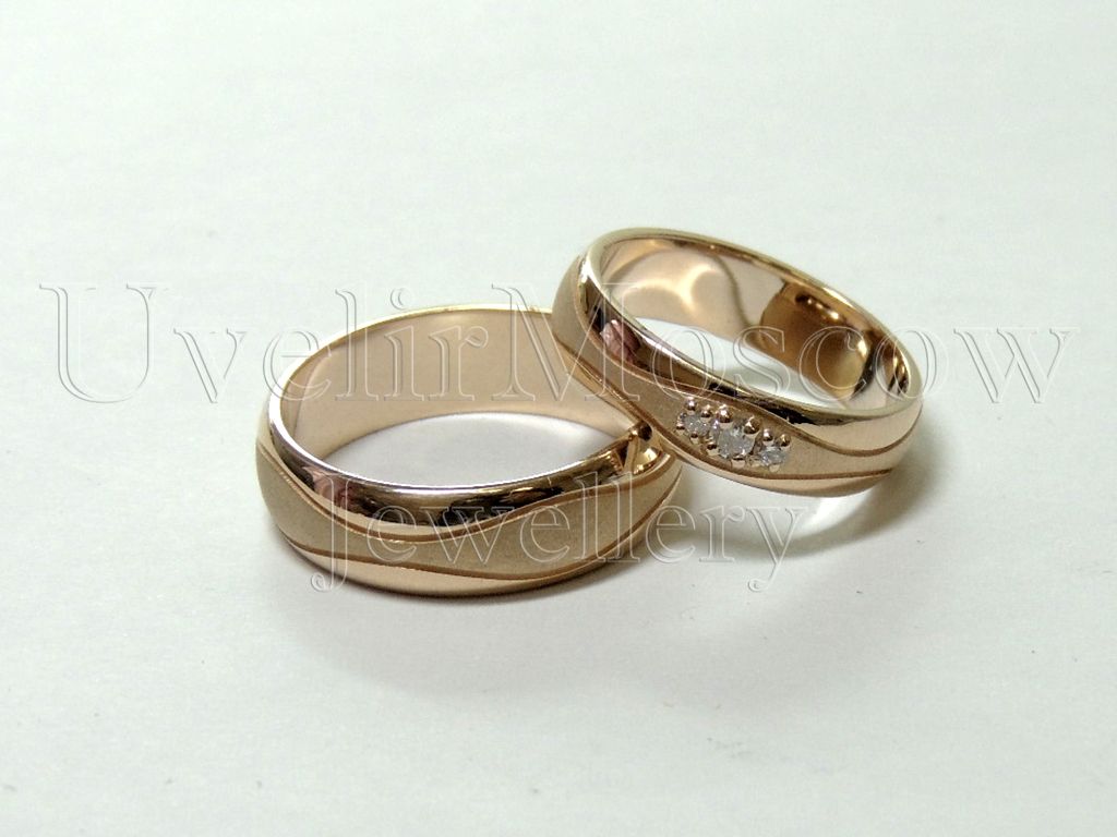 Парные обручальные кольца «Волна» из красного золота