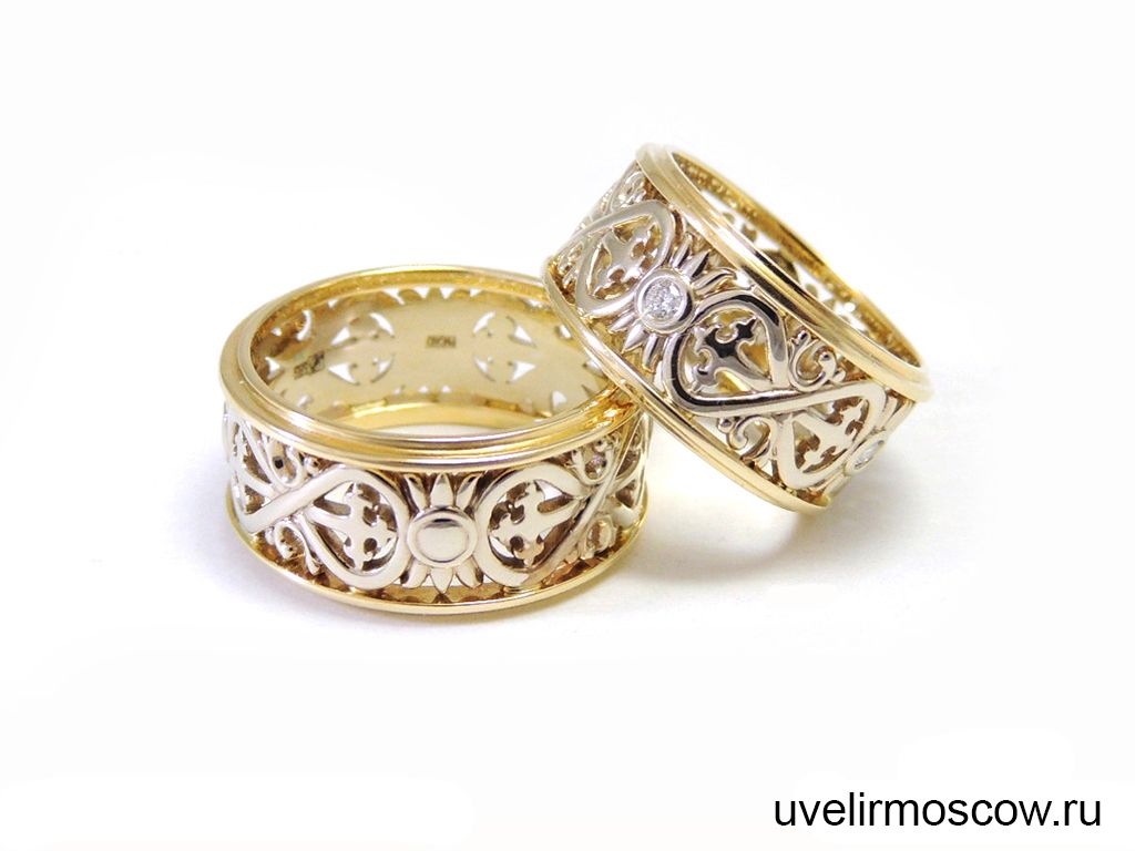 Широкие обручальные кольца из комбинированного золота с узором «Бесконечность»